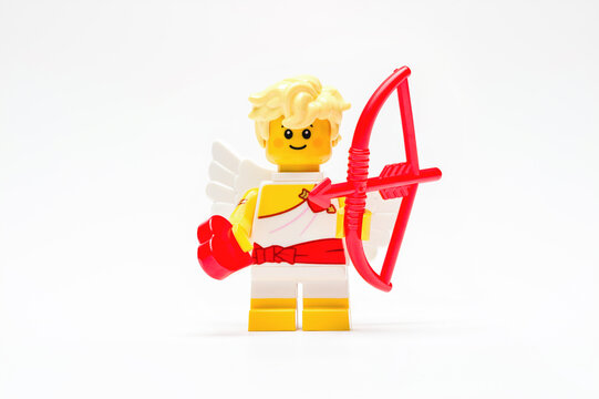 Antalya, Turkey - June 11, 2025: LEGO cupid minifigure with red bow, arrow, and heart accessory