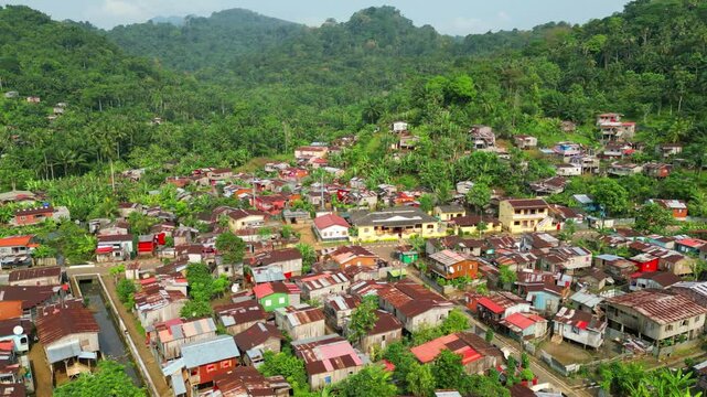 Aerial view backwards over Ribeira Afonso village with the mountains at background,in S&atilde;o Tom&eacute;,Africa.