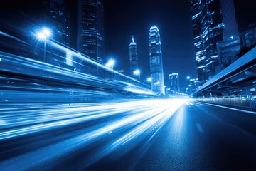Night city street, car light trails. Urban highway at night, illuminated by moving vehicle lights.  Tall buildings line the cityscape