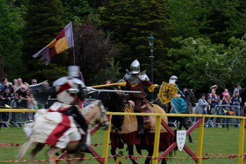 Knght Jousting Tournament. Knight in medieval armour on a horse. 