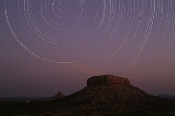 A Startrail over the monument valley of Namibia in Damaraland.
