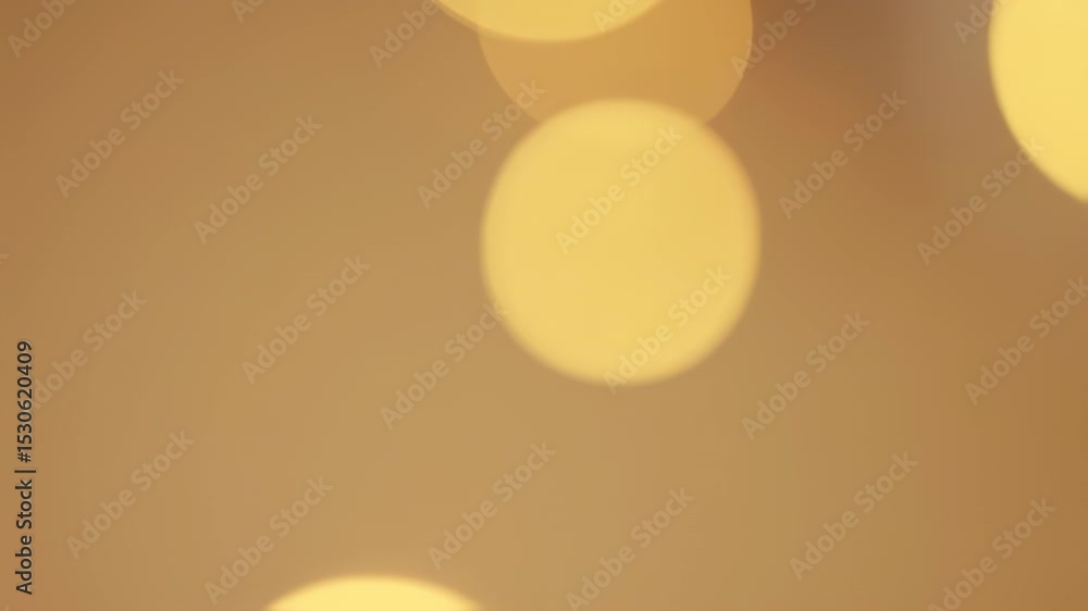 Poster golden orb light: a close-up view of soft, dreamy, bokeh circles, the image bathed in warm, radiant 