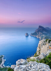 beautiful Sunset View Over Mediterranean Cliffs and Tranquil Sea