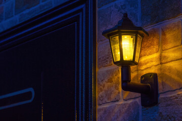 Decorative lantern on the wall of a private house