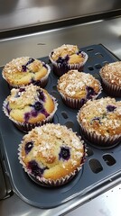 Freshly baked muffins with blueberries.