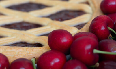 Freshly baked cherry pie with a golden crust and red cherries