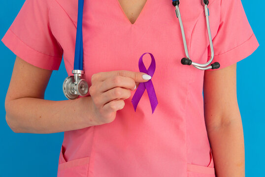 Female doctor in white uniform with purple awareness of ribbon in hand for ADD,ADHD,Alzheimer Disease ,Arnold Chiari Malformation,Childhood Hemiplegia stroke, Epilepsy, Chronic Acute Pain,Crohns