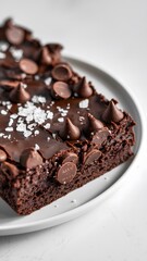 A decadent square of brownie captured in high resolution &ndash; fudge brownie wallpaper &ndash; bakery wallpaper &ndash; fudge brownie image

