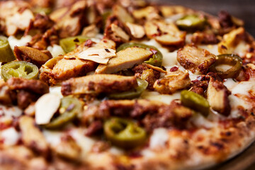 Gyros Pizza with jalapeno pepper and mozzarella cheese. Soft focus. Close up.	