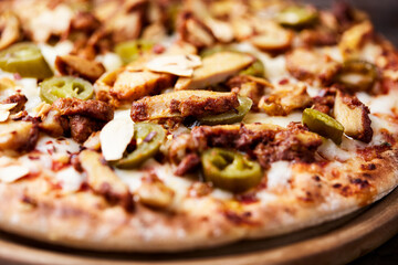 Gyros Pizza with jalapeno pepper and mozzarella cheese. Soft focus. Close up.	
