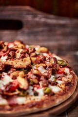 Gyros Pizza with jalapeno pepper, cherry tomatoes and mozzarella cheese. Soft focus. Close up.	