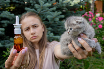 Woman Sneezing from Cat Allergy in Garden