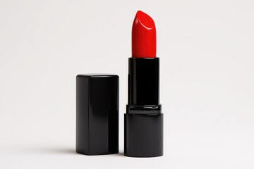 Red lipstick in a black case, studio shot