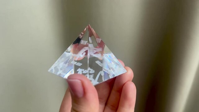 A crystal pyramid with Egyptian hieroglyphs