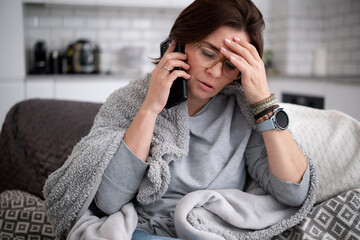 Young Woman Sick At Home And Calls The Doctor For High Fever And Headache
