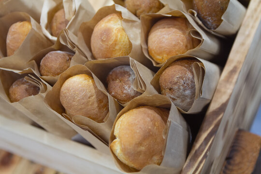 Fresh delicious baguettes on the store counter