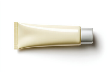 Smooth, light colored tube of sunscreen is displayed horizontally against clean white background, emphasizing its sleek design and practical use for sun protection