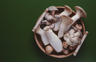Fresh eringa, oyster and champignon mushrooms from the local farm market, healthy vegetarian cooking