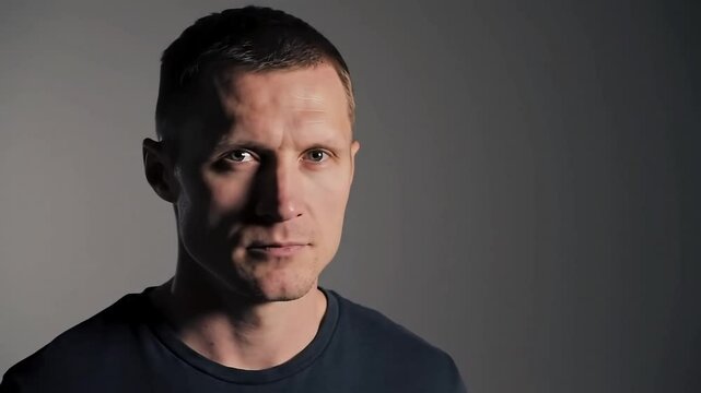 Stoic Russian Man with Steel Gray Eyes - Powerful Portrait in Dramatic Contrast Lighting