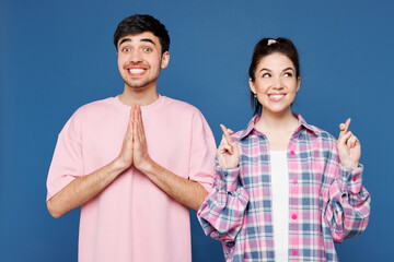 Young couple two friends family man woman they wear pink casual clothes together hold hands folded...