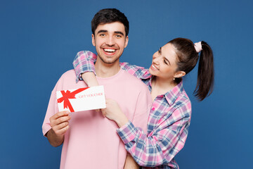 Young couple two friends family man woman they wearing pink casual clothes together hold gift...