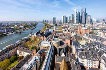 Frankfurt skyline skyscrapers in city center with the Römer and Main river from above in Frankfurt, Germany