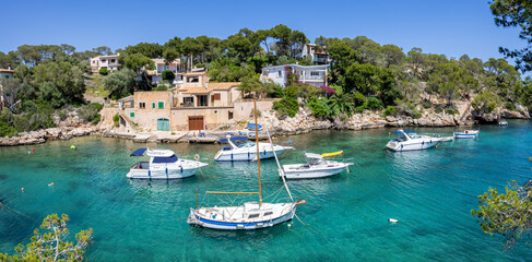 Bay of Cala Figuera on Mallorca island with boats panorama holiday by the sea in Spain