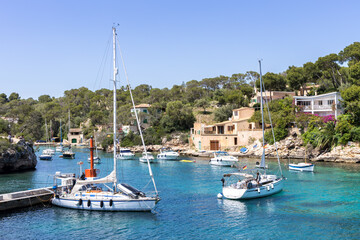 Bay of Cala Figuera on Mallorca island with sailboats holiday by the sea in Spain