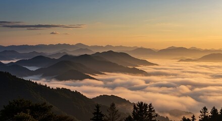 Golden Sunrise over Misty Mountain Range with Layers of Clouds – Peaceful and Atmospheric Landscape for Nature and Travel Concepts
