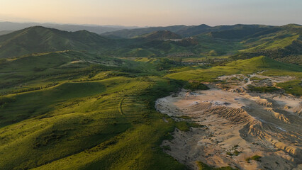 Buzău's Boiling Mud Volcanoes. 
This photo provides a glimpse into this extraordinary geological...