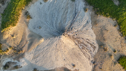 Buzău's Boiling Mud Volcanoes. 
This photo provides a glimpse into this extraordinary geological phenomenon, where the Earth seems to be constantly in motion.