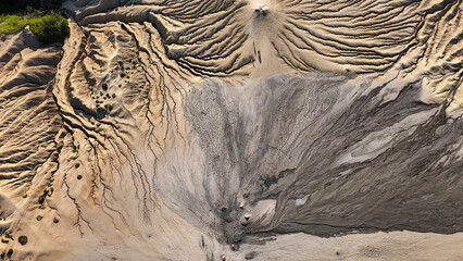Buzău's Boiling Mud Volcanoes. 
This photo provides a glimpse into this extraordinary geological phenomenon, where the Earth seems to be constantly in motion.