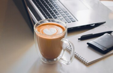 a cup of coffee in the middle of work