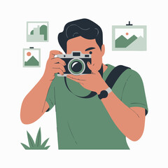 Young man taking photographs with vintage camera green shirt art lens film work image style hobby