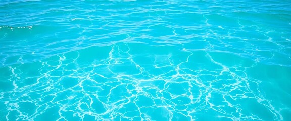 Obraz premium Serene turquoise ocean water, sunlit surface, gentle waves, background, waves