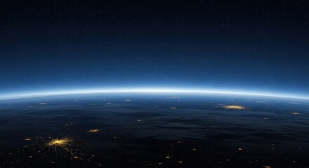 A view of earth from space showing city lights and the atmosphere against a dark blue starry sky