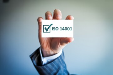 Business card displayed with iso 14001 certification.