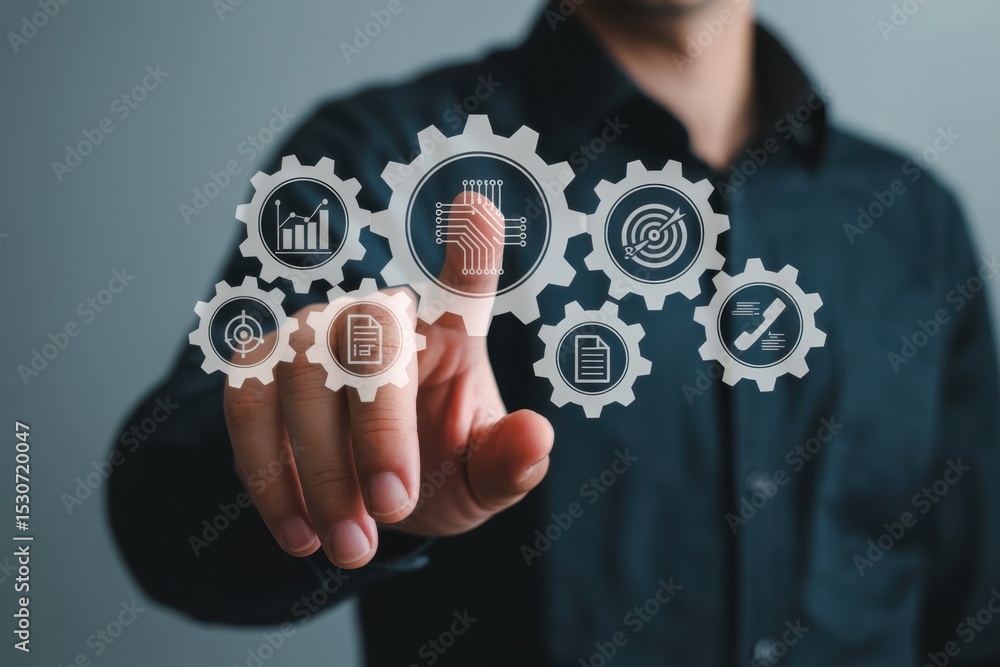 Aufkleber a person interacts with a projected interface of interconnected gears with business icons.