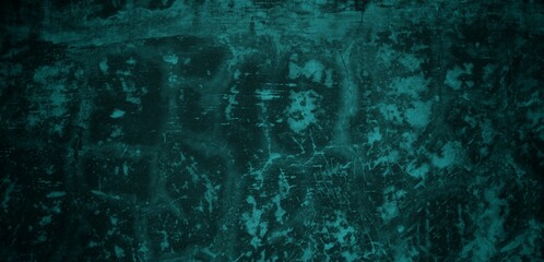 A textured background featuring a deep teal color with a distressed, grunge appearance. The surface shows variations in tone and subtle patterns, creating an abstract and moody aesthetic.