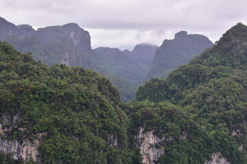 Naklejka premium cloudy calcareous mountains, Green mountains and clouds, mist clouds after rain