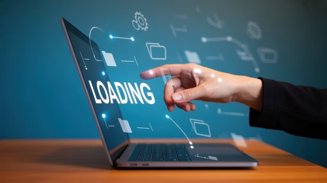 A hand touches a laptop screen with a loading interface.