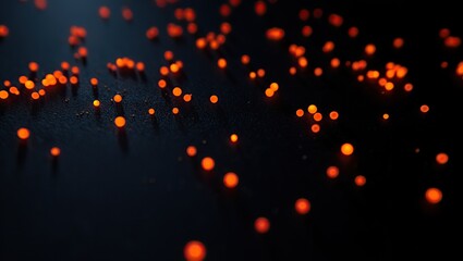 Bright orange particles glow and move across a dark textured background, creating a vivid, energetic, and immersive abstract scene.