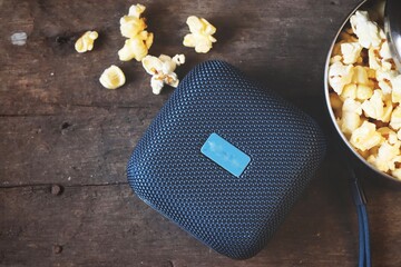 Bluetooth speaker on wood table