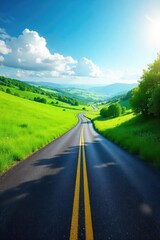Fototapeta premium A winding asphalt road cuts through a vibrant green landscape, disappearing into the distance under a bright, sunny sky Perfect for travel, adventure, and nature themes , bend, hills, mountains