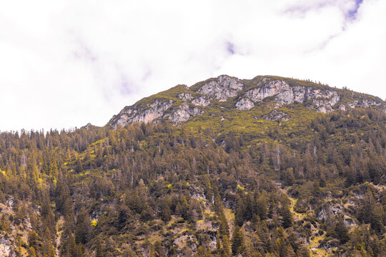 Alpine mountain range and hill landscape panorama view Tyrol Austria.