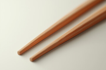 Obraz premium Closeup of cozy wooden chopsticks, natural materials