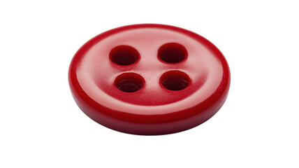 Fototapeta premium A round red button with four holes lies flat against a smooth white background, highlighting its vibrant color