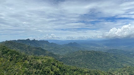 Naklejka premium clouds over the mountains