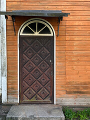 old wooden door in a stone wall