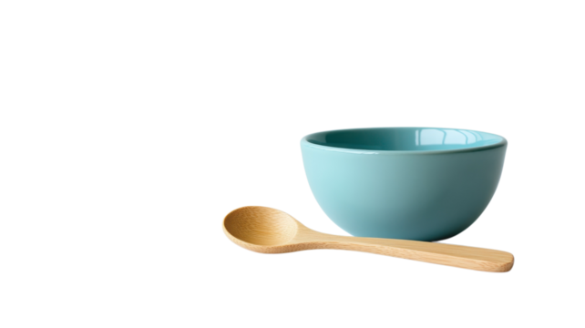 A chic blue mixing bowl and wooden spoon highlight minimalist kitchen essentials